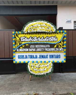Papan Bunga Duka di Karang Sidemen